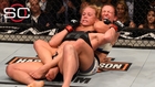 Tate submits Holm to capture title