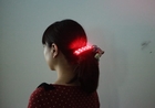 Chouchou Ponytail: A smart hair accessory that swings a ponytail depending on your heart rates