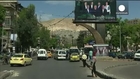 Syria: Polls and peace talks as fighting escalates