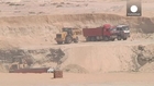 Egyptian president unveils pet Suez Canal project
