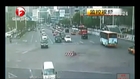 Scooter rider and Taxi both jump the lights, rider loses out badly