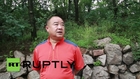 China: Stone-cold slimming! Man loses 30kg by putting ROCK on his head