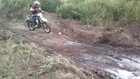 Dirt Biker Crashes in Mud to Friend's Amusement