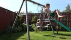 Luke and Rachel playing on the Swing in the Garden (4K Ultra HD)