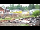 Woman hires bulldozer to demolish neighbor's home