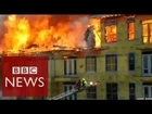 Man rescued as burning building falls in Texas - BBC News