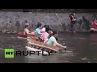 Japan: Bathtime gets brutal as hundreds battle it out in bathtub race