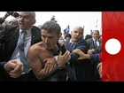 Air France mangers' clothes ripped off by angry mob, France