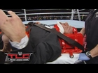 Triple H helped by paramedics after being attacked by Roman Reigns: WWE.com Exclusive, Dec. 13, 2015
