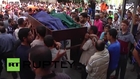 State of Palestine: Hundreds mourn the Abu Dahroug family, killed by F-16 strike *GRAPHIC*