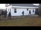 80 Amish pick up and move a house