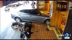 Dramatic footage shows moment a car runs into restaurant