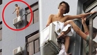 Naked Woman Teeters on 11th Floor Air Conditioner