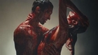 Adam and Behati naked and bloody in Maroon 5 video