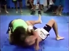 Female vs black male muscle wrestling match MMA (figure 4 head lock women belly and headscissor)